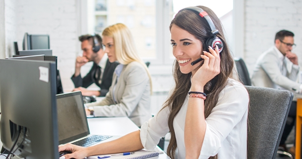 A woman works at a domestic call center