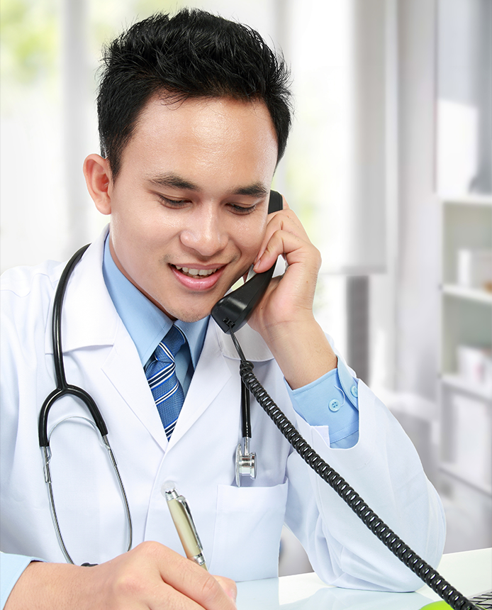 A male doctor is speaking on the phone with a Medical Device Inbound Contact Center